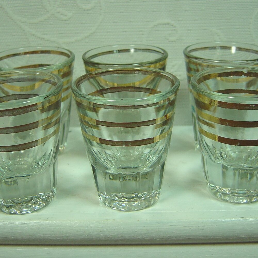 6 Anchor Hocking clear shot glasses with 3 gold rings--2 1/4" tall